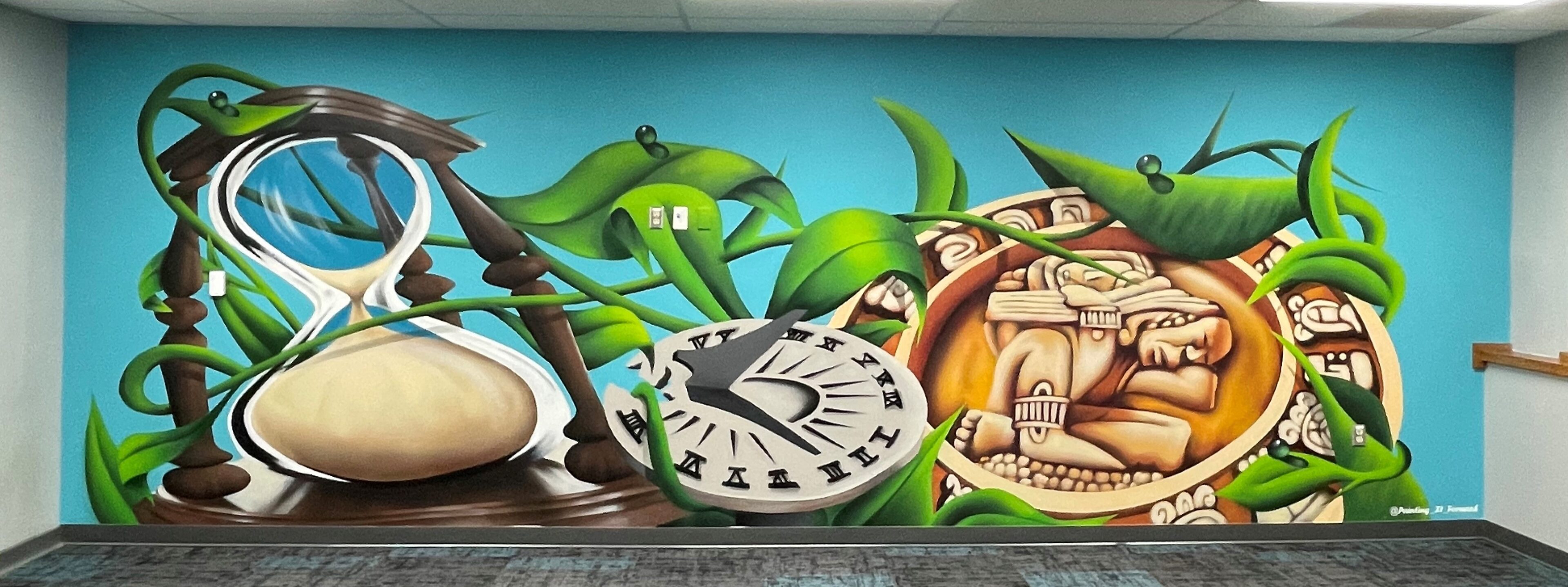 A mural of clocks and plants on the wall.